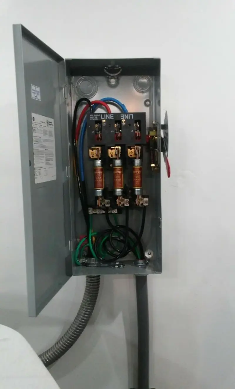 Three-phase disconnect switch installed for Smoke Detector Installation in Clearfield
